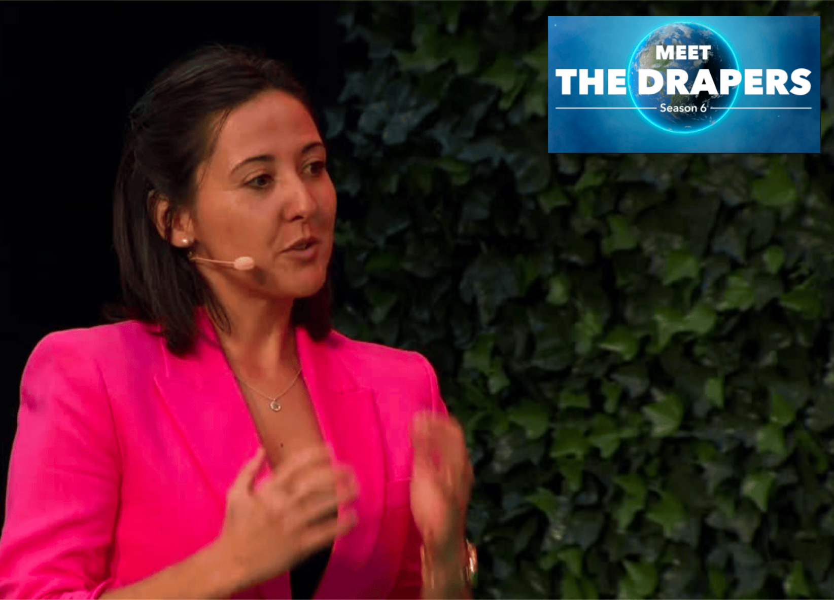 Jenifer Clausell-Tormos presenting at a startup event — founder and inclusive leadership coach. The event is Meet the Drapers in TechBBQ in Copenhagen